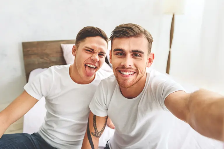 Happy gay couple selfie